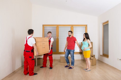 Student packing items for storage in Ratcliff before moving out