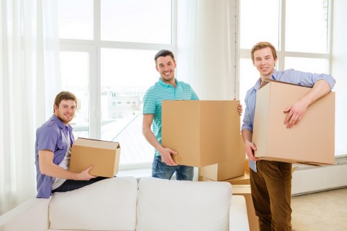 A removals team packing and loading belongings in Ratcliff